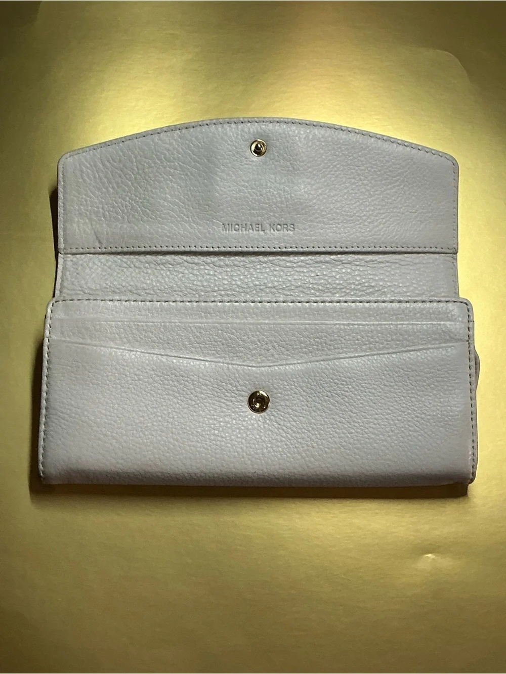 Michael Kors previously owned